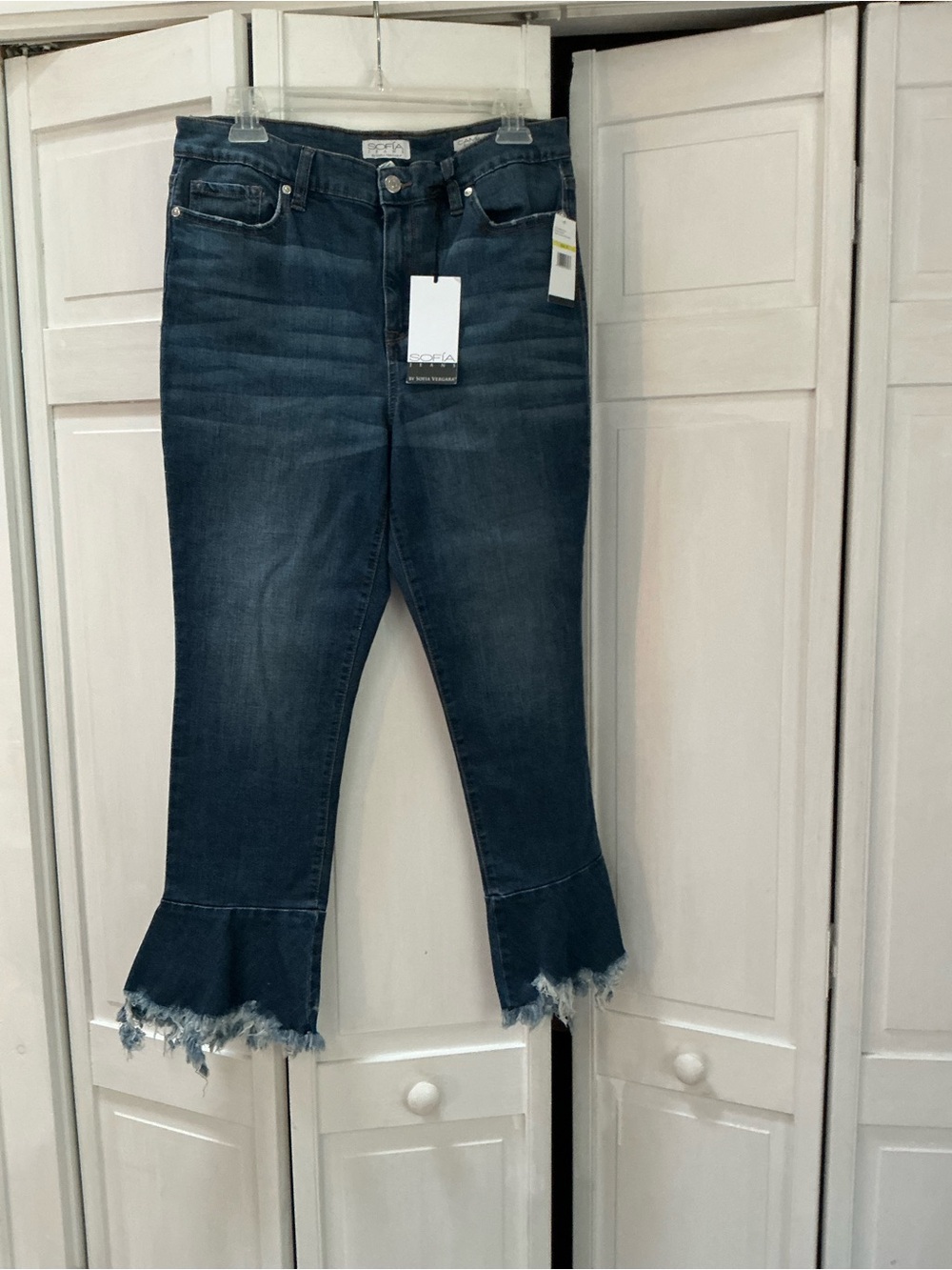 SOFIA Vergara Dark Blue Cropped Flare Jeans with fun flare bottom